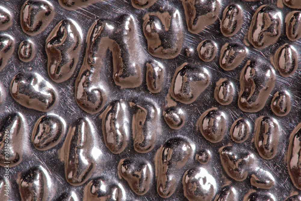 Closeup of a silver metallic surface Closeup of a silver metallic surface