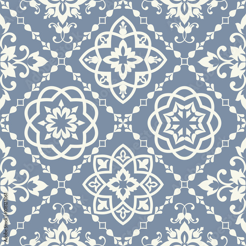 seamless tile with Victorian motives in blue and grey
