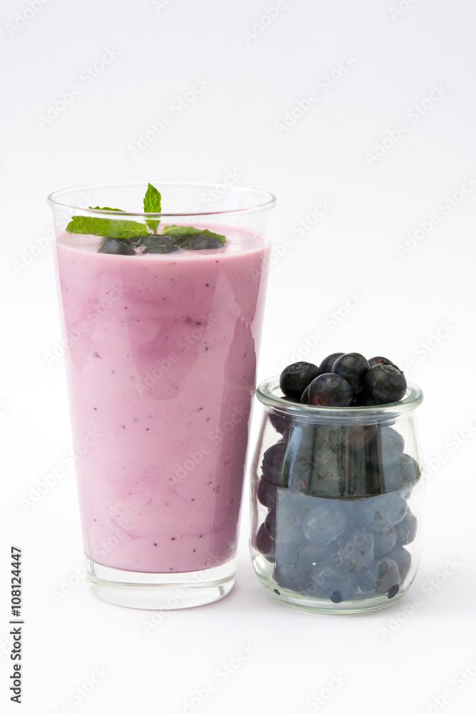 Fresh blueberry smoothie on white background
Fresh blueberry smoothie on white background