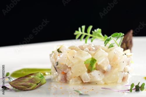 Photos Fine dining appetizer, fish tartare with asparagus