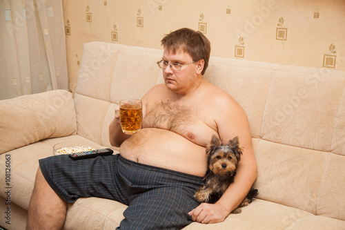 fat man drinking beer