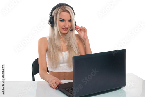 The girl in headphones with laptop