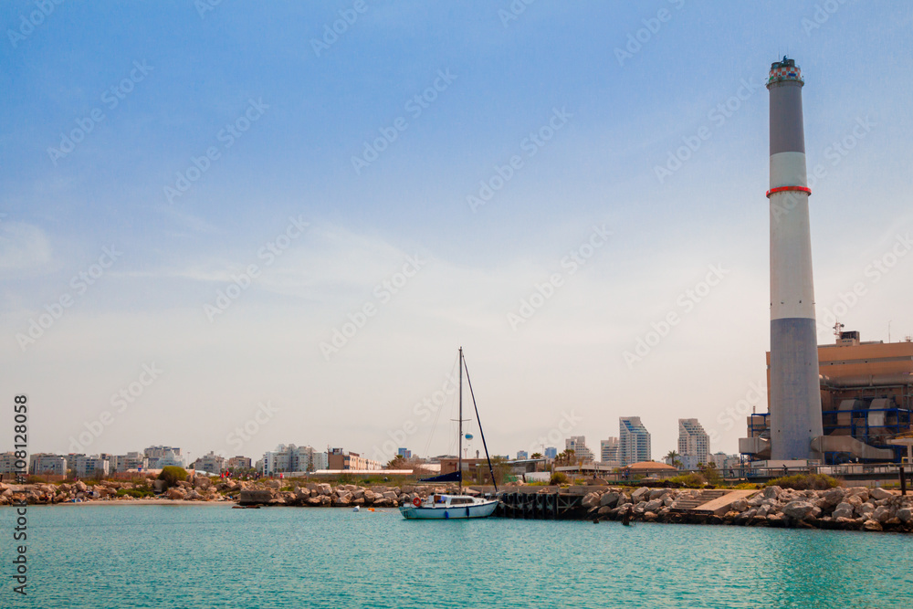 Sailboat docked at the pier near the Reading power station in Tel Aviv, Israel
