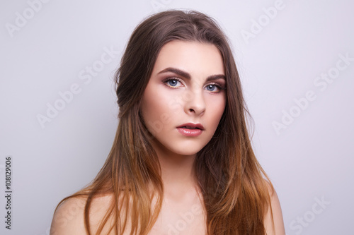Fashionable portrait of a girl model. Fashion, glamour accessories, nude makeup. Freedom spring bright style lady, nude shoulders.