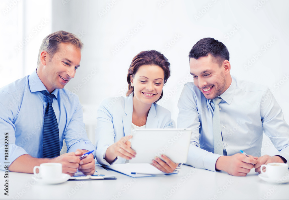 business team looking at tablet pc in office business team looking at tablet pc in office