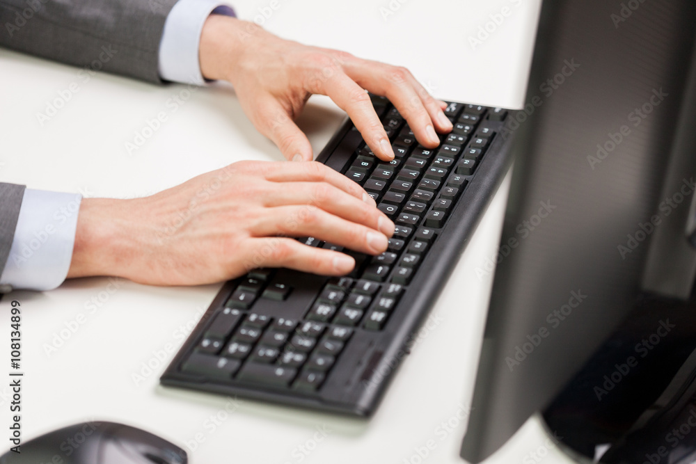 close up of businessman hands typing on keyboard close up of businessman hands typing on keyboard