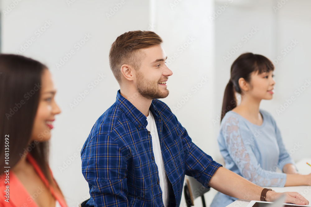 happy creative team or students working at office happy creative team or students working at office