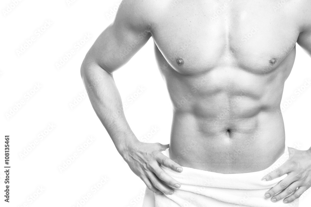 Muscled young man posing in towel (black and white edition) , is