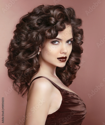 Beauty fashion portrait of Beautiful woman with dark lips makeup