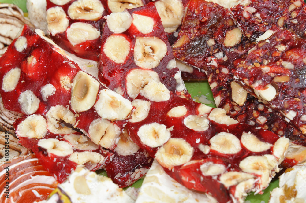Colorful Turkish delights with nuts and chocolate Colorful Turkish delights with nuts and chocolate