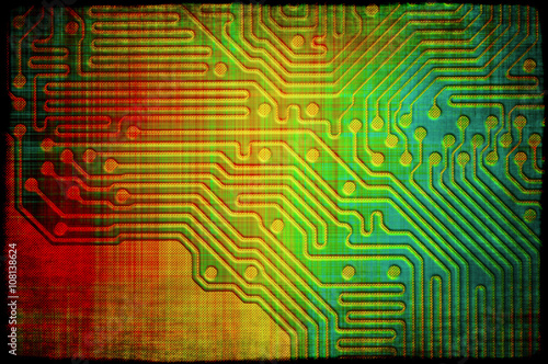Grungy mulitcoloured printed circuit board background photo