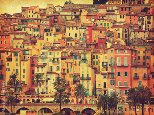 Colorful houses in old part of Menton, France.  Added paper texture. Toned image