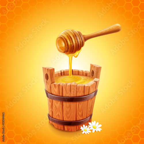 honey with stick and bucket