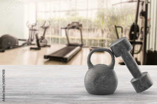 working out concept with kettle bells and dumbbells