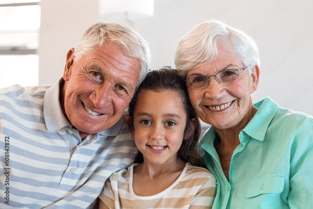 Grandmother and grand father with their granddaughter Grandmother and grand father with their granddaughter