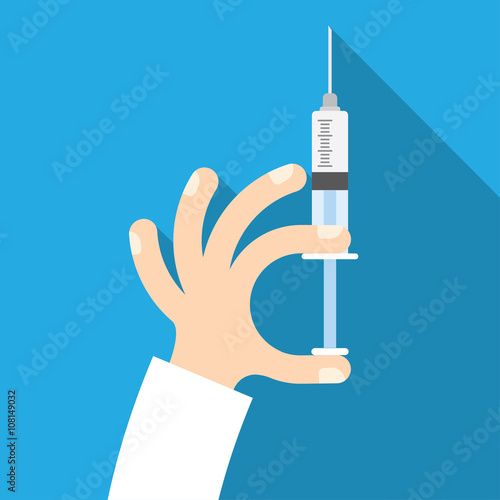syringe in doctor hand