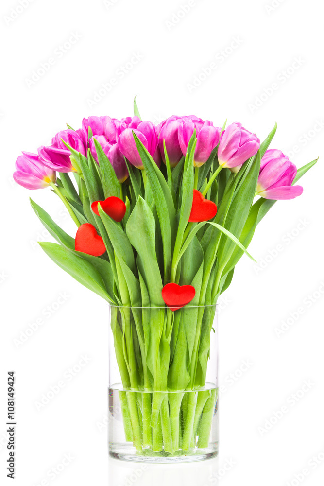 Spring tulips in the vase on white background Spring tulips in the vase on white background