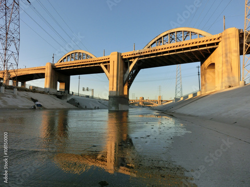 Beautiful bridge over LA river canal at dusk with reflection - landscape color photo