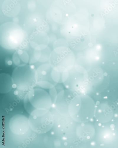 Festive winter abstract nature background with bokeh lights and