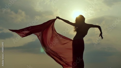 beautiful girl dancing with red cloth