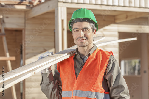 Contractor operating a power tool
