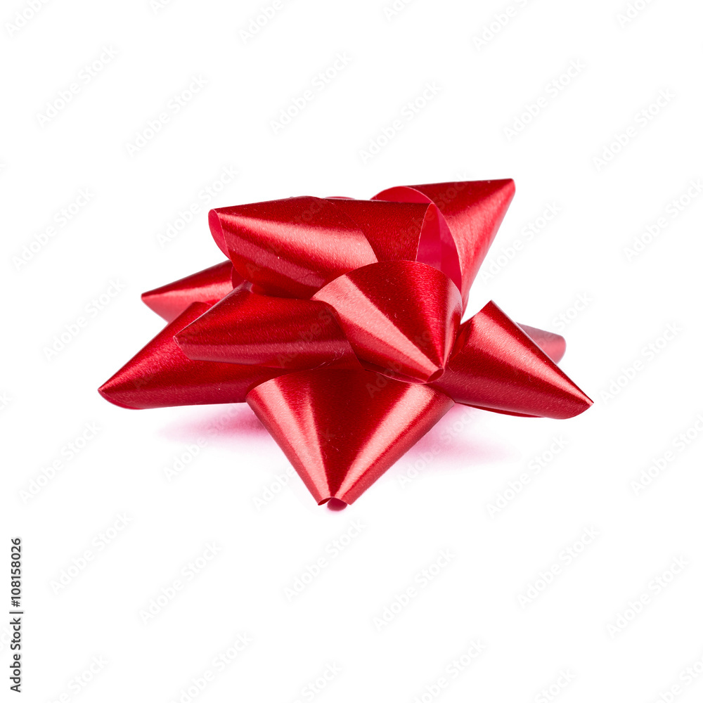 Red ribbon bow with tails isolated on white background. Red ribbon bow with tails isolated on white background.