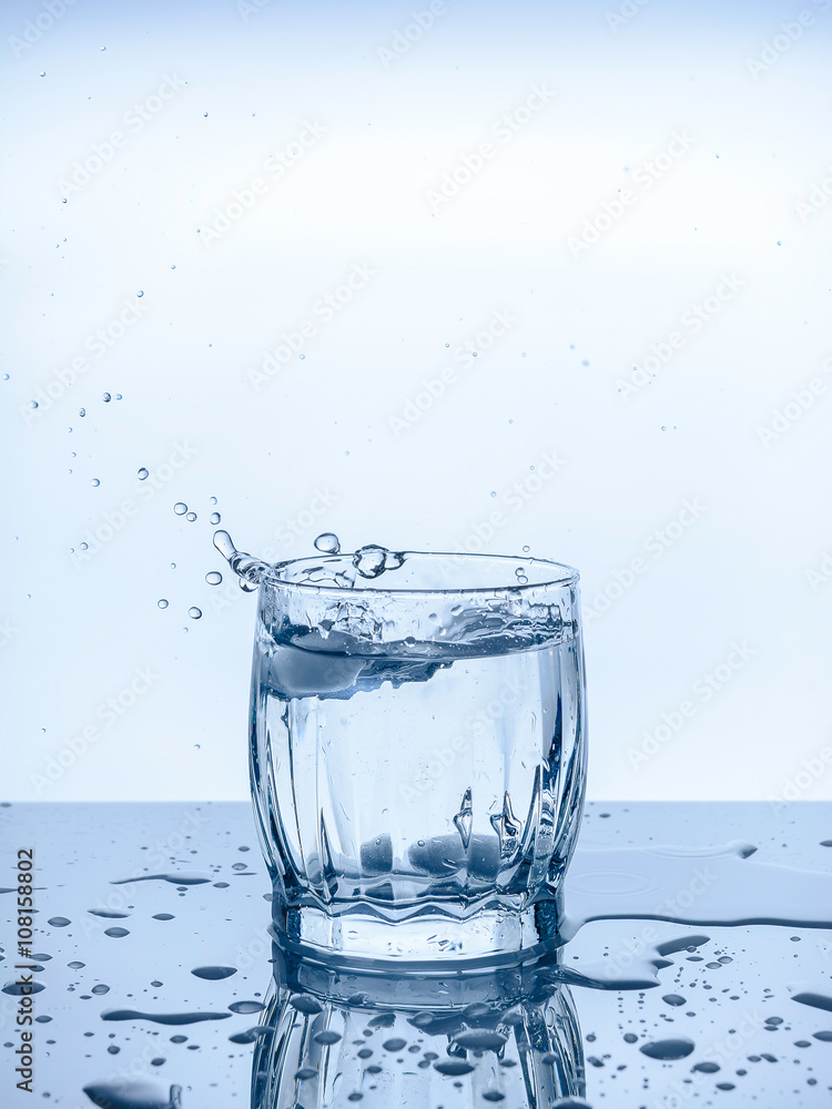 a glass of water ice drops splashes freshness thirst a glass of water ice drops splashes freshness thirst