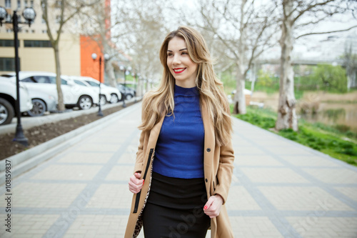 Young beautiful business woman, outdoors portrait