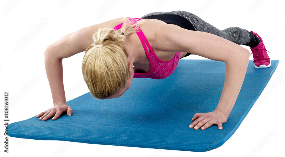Beautiful young woman doing pushups. Beautiful young woman doing pushups.