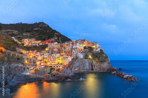 Sunset in Manarola.Manarola is a small town, in the province of La Spezia, Liguria, northern Italy. It is the second smallest of the famous Cinque Terre towns frequented by tourists.