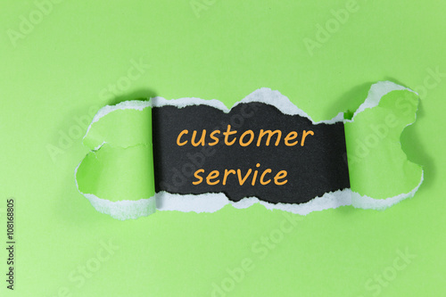 customer service written under torn paper