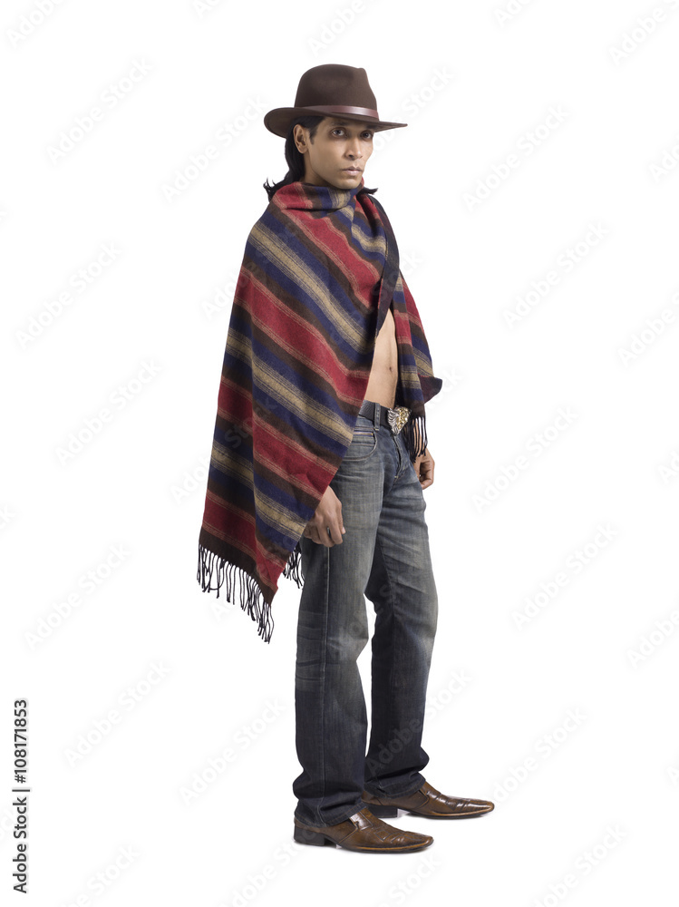 man with shawl on his body and wearing cowboy hat man with shawl on his body and wearing cowboy hat