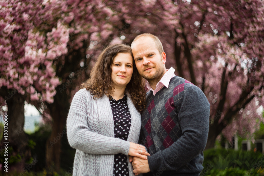 Happy couple with spring trees Happy couple with spring trees