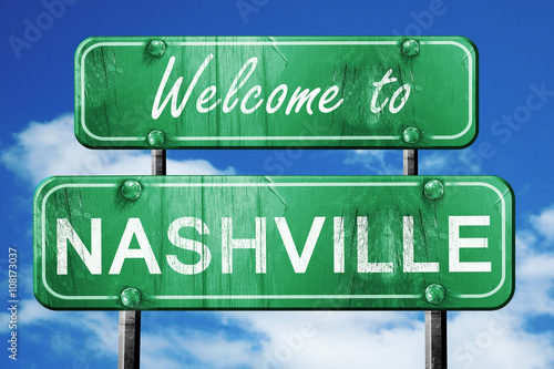 nashville vintage green road sign with blue sky background