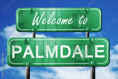 palmdale vintage green road sign with blue sky background photo