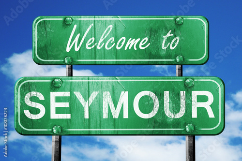 seymour vintage green road sign with blue sky background photo