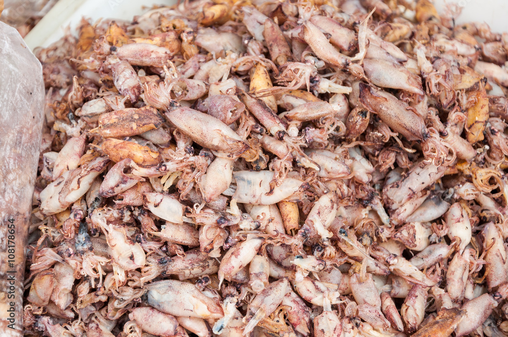 dried squid pile at market