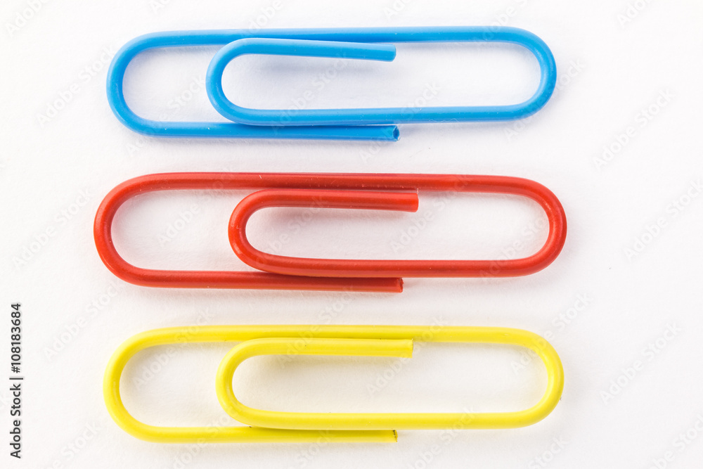 blue red and yellow paper clips macro blue red and yellow paper clips macro