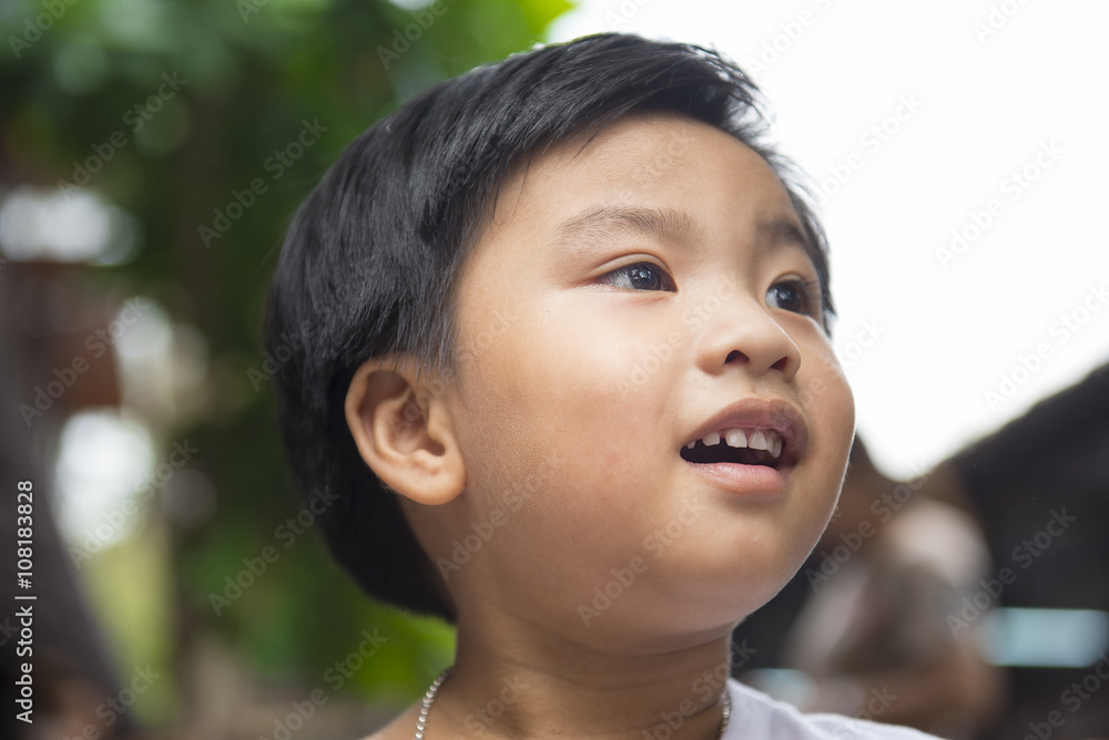 Smiling clever little boy