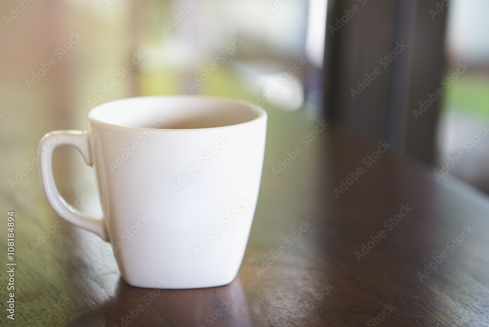 Cup of coffee on table in cafe Morning light , vintage tone. Cup of coffee on table in cafe Morning light , vintage tone.