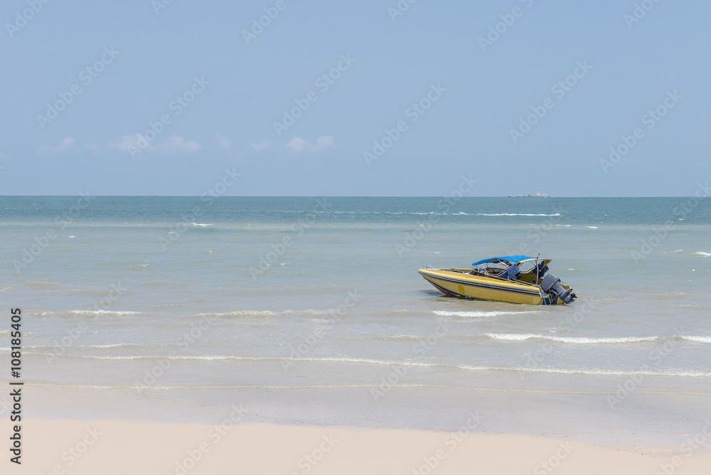 Fototapeta premium Lonely boat at the sea