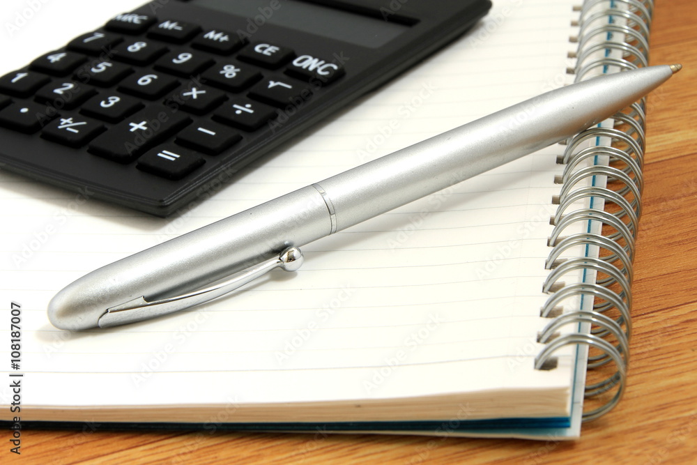 calculator and pen calculator and pen