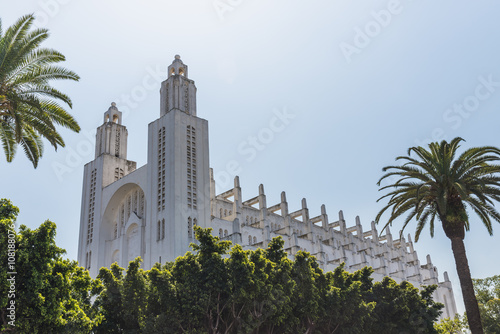 The outside of casablanca cathedral with tree