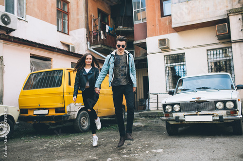 Youth and fashionable couple on the streets.