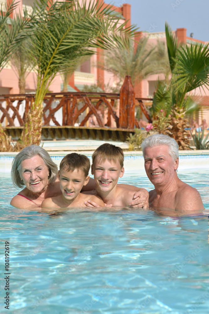 Happy Elderly couple with grandsons