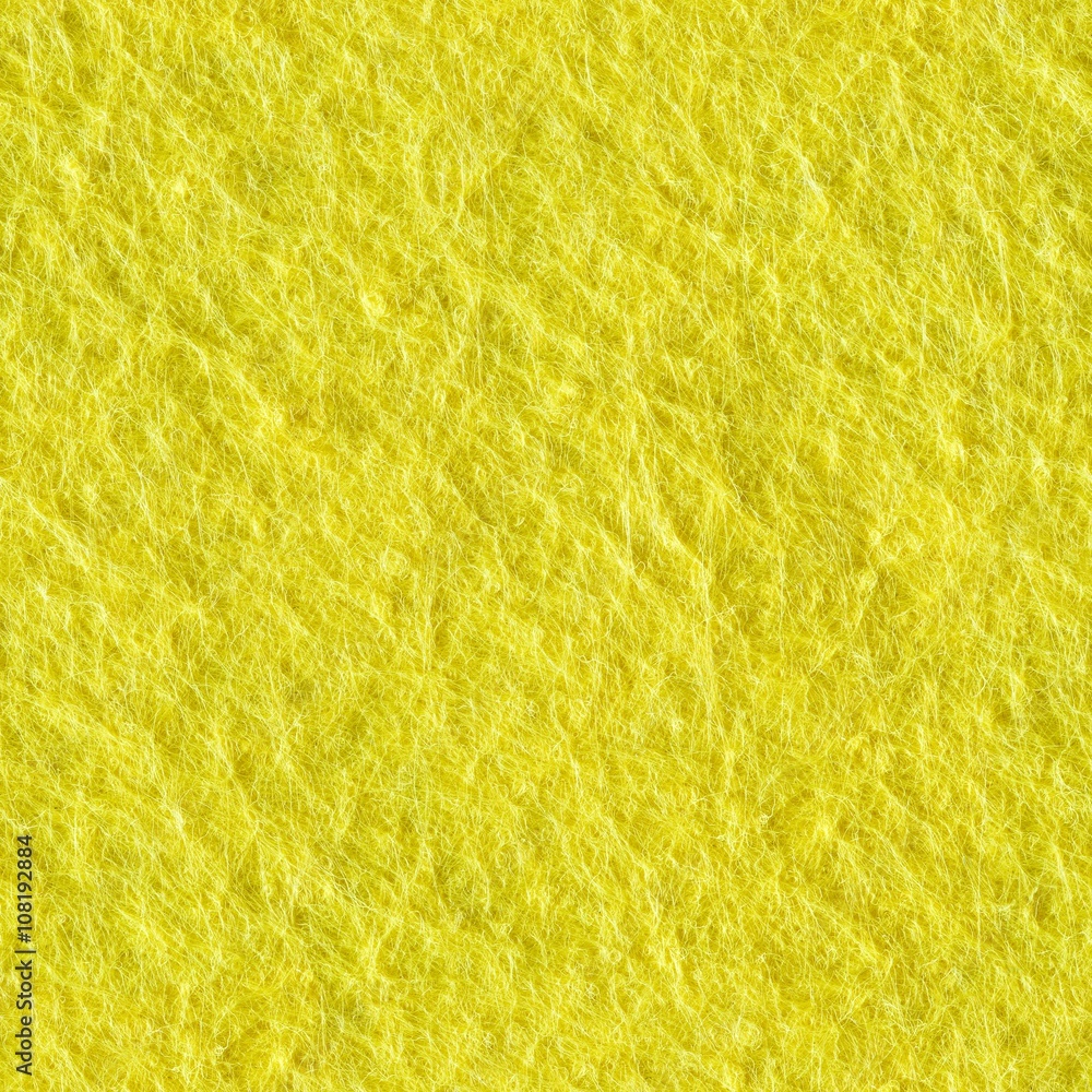 A close up of Yellow felt. Seamless square texture. Tile ready
