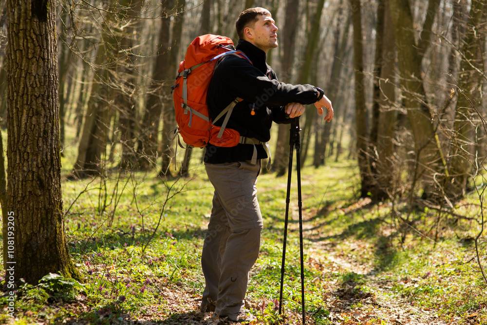 Active healthy man hiking in beautiful forest Active healthy man hiking in beautiful forest