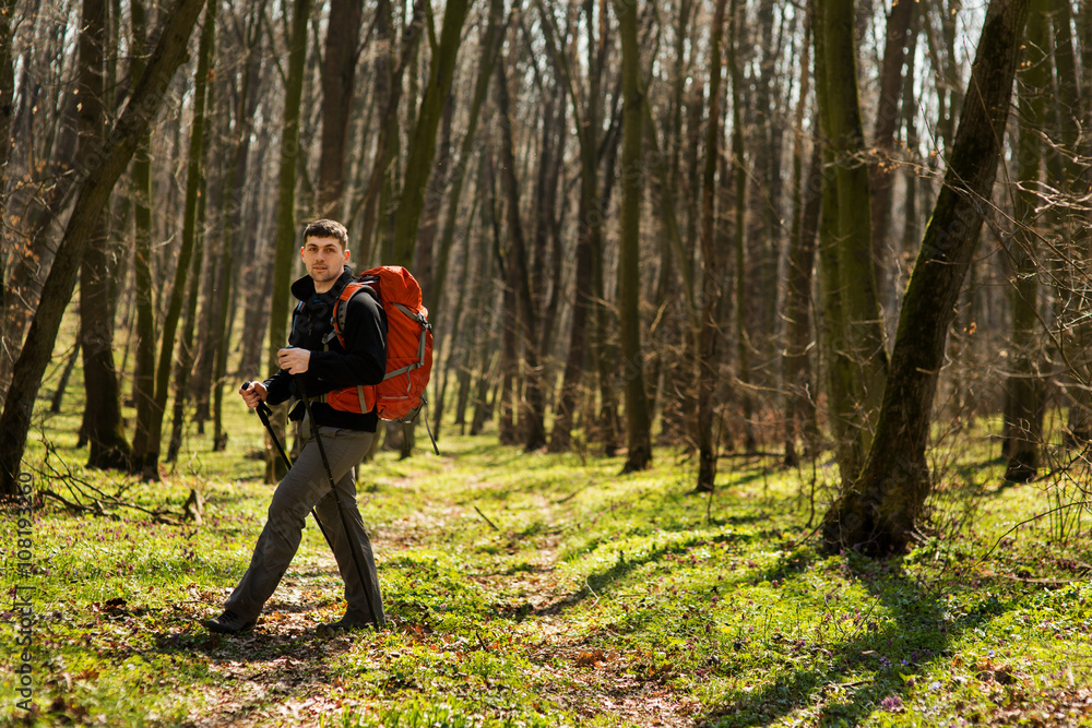 Active healthy man hiking in beautiful forest Active healthy man hiking in beautiful forest