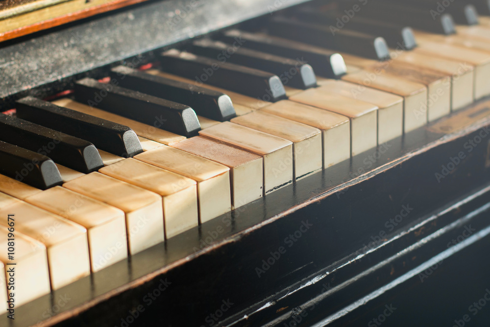 Old rusty piano keyboard, selective focus, soft light filter Old rusty piano keyboard, selective focus, soft light filter