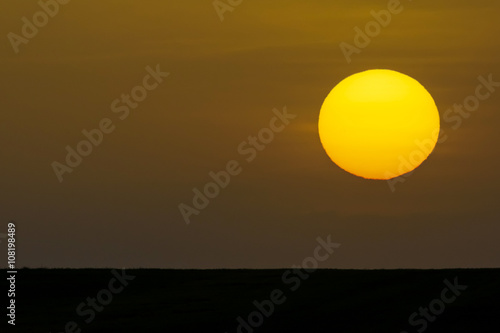 Sun setting over agriculuture landscape, Haute Marne, France photo